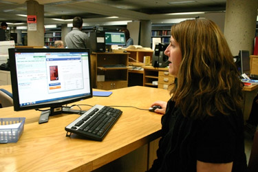 Librarian demonstrates a database search