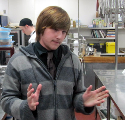 Grade 11 student Wyatt Albert explains his duties as co-op worker in the Prince George Hotel Kitchen. Photo: Andrew Mills