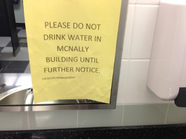 Signs are posted in the McNally Building at SMU to warn people against drinking the water. (photo: Bhreagh MacDonald)