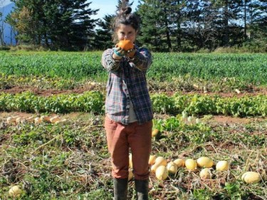 Stephanie Dewar displays last seasons bounty. (Photo by: Heart Beet Organics)