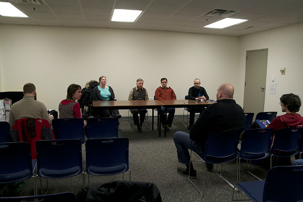 An audience listens to the panel on mental health services available to students. Photo: Heather Brimicombe