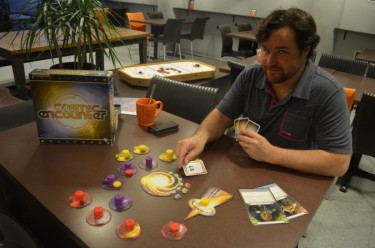 Jon Paul Decosse, GM at the Board Room Cafe plays Cosmic Encounter.
