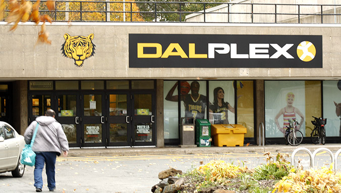 A man walks towards the main entrance at Dalplex.