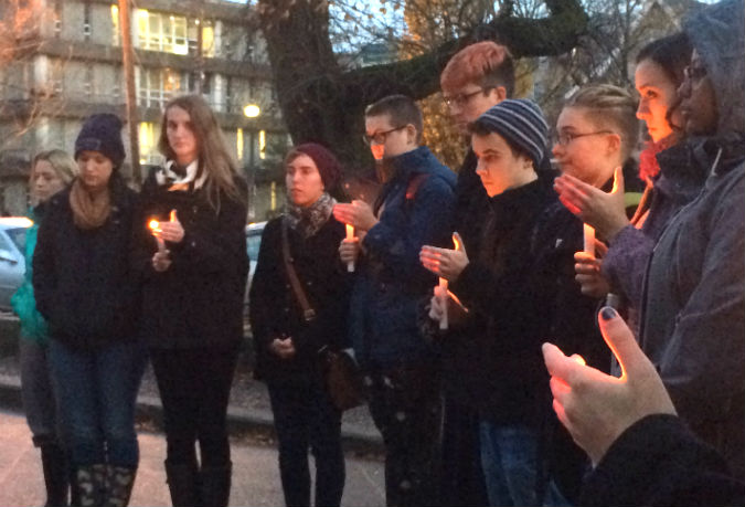 Students lit candles in remembrance.