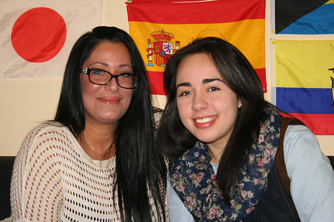 Priscillia Darcy, left, partners with a student from Mexico to improve her Spanish. Photo: Ameya Charnalia