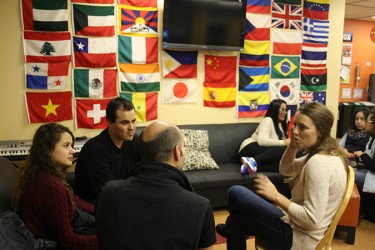Foreign students discuss Latin American culture in English and Spanish with Haligonians. Photo: Ameya Charnalia