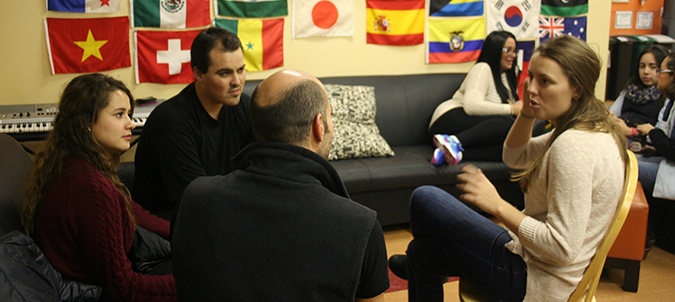 Foreign students discuss Latin American culture in English and Spanish with Haligonians. Photo: Ameya Charnalia