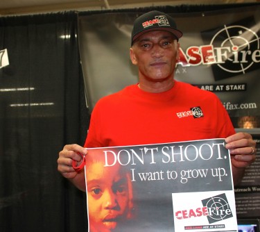 Shawn Parker at the CeaseFire booth during the Teens Talk Now Expo. Photo: Sergio Gonzalez.