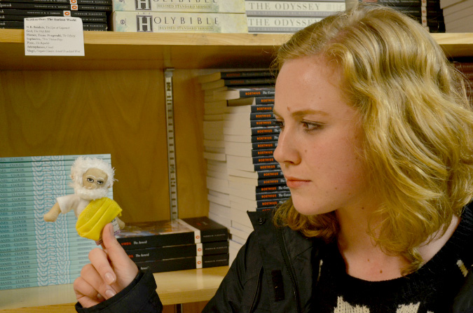 Julianne Steeves poses with a Plato finger puppet - the subject of her KIng's parody Twitter account's profile picture. Photo: Matt Jamieson