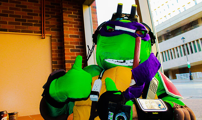 Photo of a man dressed as Donatello (from Teenage Mutant Ninja Turtles)