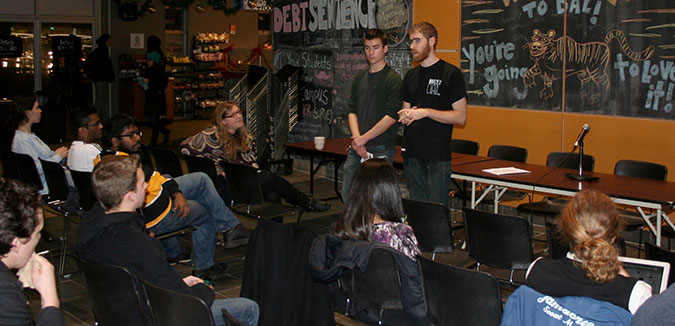 Members of the Dalhousie student Union address the crowd at the Town Hall meeting. Photo: Ben Blum