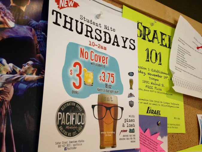 Even after two weeks, posters around campus like this continue to violate Dal's alcohol policy. Photo: Julia Manoukian