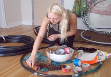 Taylor Barei making hula hoops and working on activities she hopes to use at her arts therapy cafe. Photo: Thoshlae Smith