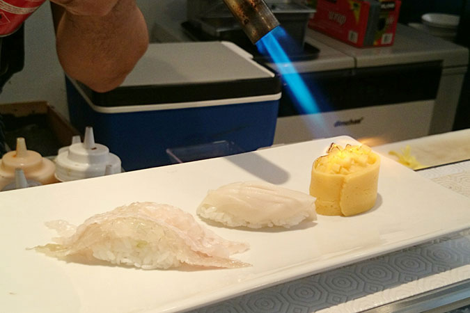 Sushi (engawa is on the left) cooked by Alex Oh. Photo: Takaichi Kogata
