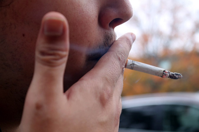 Saint Mary's campus is officially tobacco-free but some students continue to smoke on campus or walk to the edge of campus to light up. Photo: Ameya Charnalia