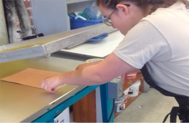 NSCAD University student Hannah Genosko works on a silkscreen. Photo: Ben Cousins
