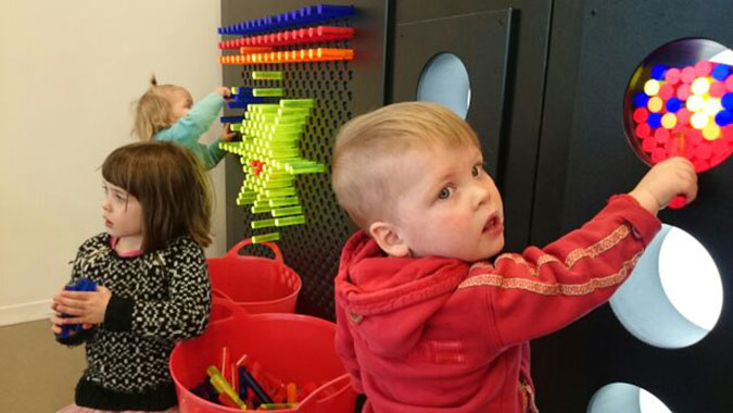 Kids playing with toys in the Halifax Central Library. Photo: Takaichi Kogata