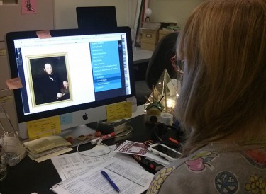Natalie Slater, administrative assistant at the Saint Mary’s Art Gallery, checks out a photo of “Eddie” on the gallery website. Photo: Christian McCuaig