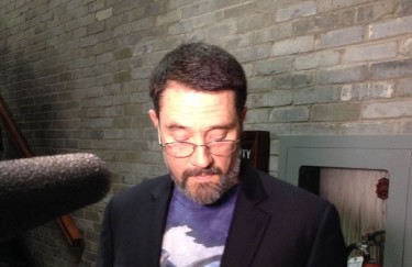 Senate chairman Alan Pinder explains the past motion to the media. Photo: Graeme Benjamin
