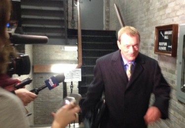 Dean of dentistry Tom Boran leaves meeting without answering media's questions. Photo: Graeme Benjamin