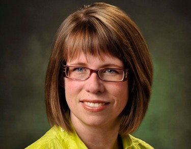 Heather Sparling, associate professor of ethnomusicology at CBU, says her new exhibit on Atlantic Canadian disaster songs will be finished by June 2015. This is her first exhibit for museums. Photo: CBU Press