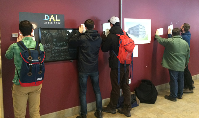 Male students fill out forms. Photo: Nikki Sacuta
