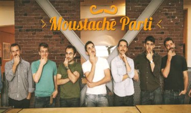 Brad Tapson, second from right, created a calendar with his group to help raise money for Movember in 2014. Photo: Courtesy of Brad Tapson