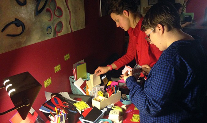 Lauren Abbott helps Jesse pick out supplies for her valentines. Photo: Angela Crozier