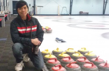 Patrick Fulgencio, shown here at the Mayflower Curling Club, is on his way to Estonia to photograph the World Junior Curling Championships. Photo: Jake Saltzman